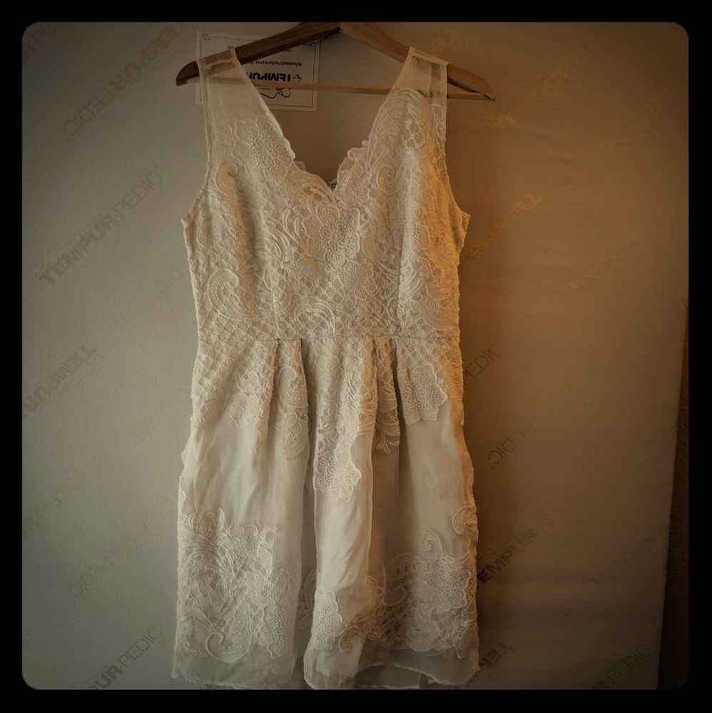 *New Beautiful white lace dress, never worn.